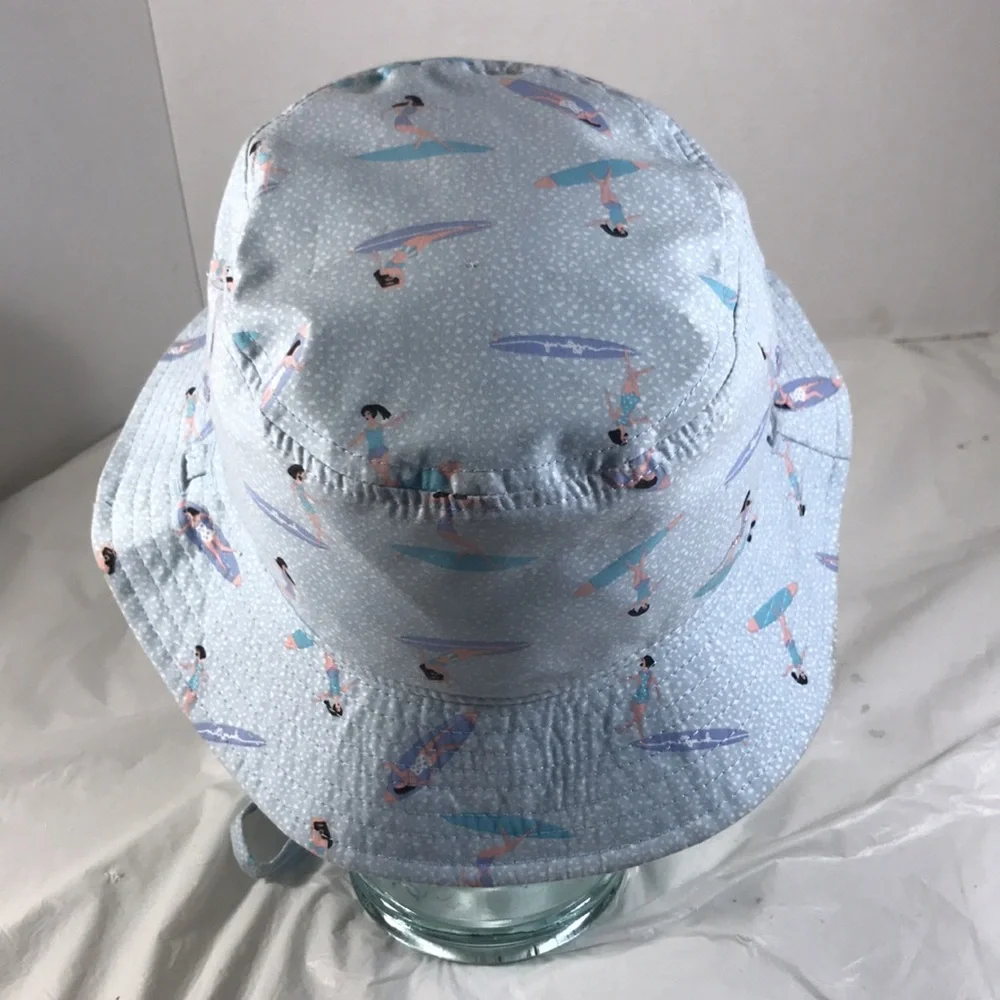Mollymook Girls Reversible Light Blue With Surfer Girls Print A Sun Bucket Hat